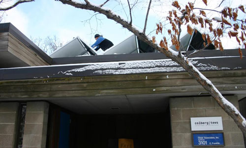 Close Associates Rooftop Solar Panels being installed